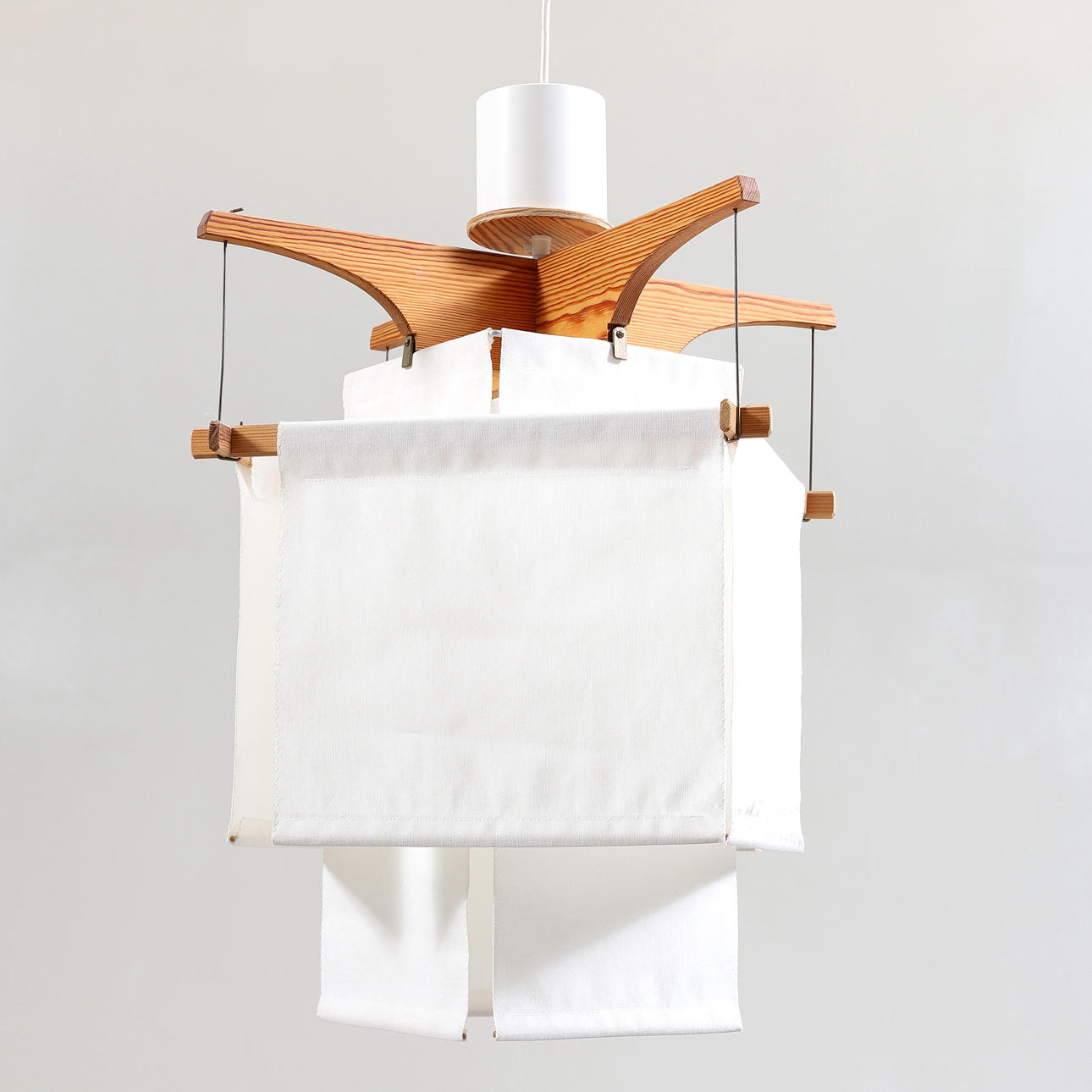 ERIK ASMUSSEN. A pine & textile ceiling lamp, “Bumblebee”, Robeldge A.B., second half of the 20th century.