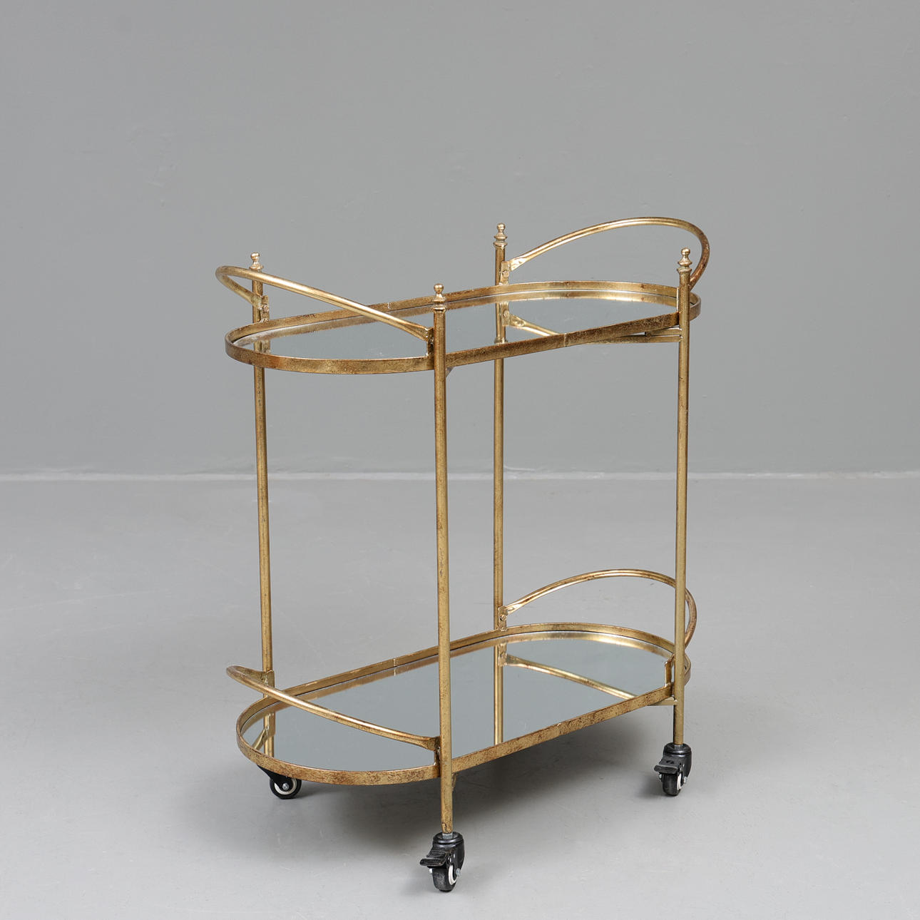 SERVING TROLLEY, metal and mirror glass, circa 2000.