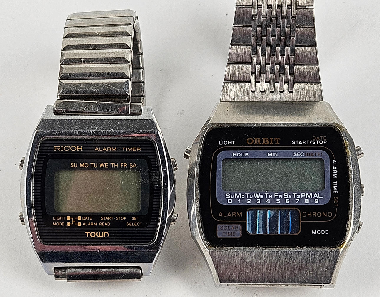 DIGITALA ARMBANDSUR, 2 st, stål, Ricoh och Orbit.