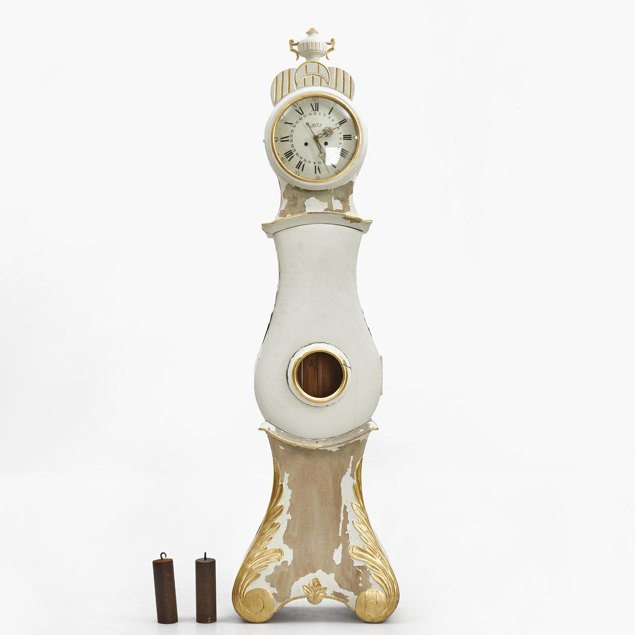 A rococo, carved and bronzed floor clock, 19th century.