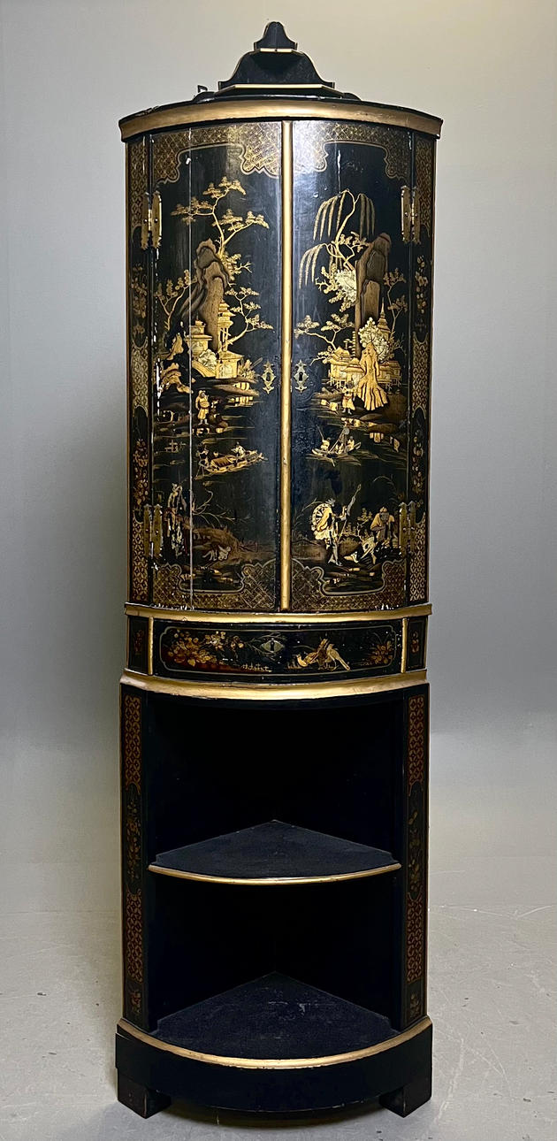 A rococo corner cupboard, 18th century.