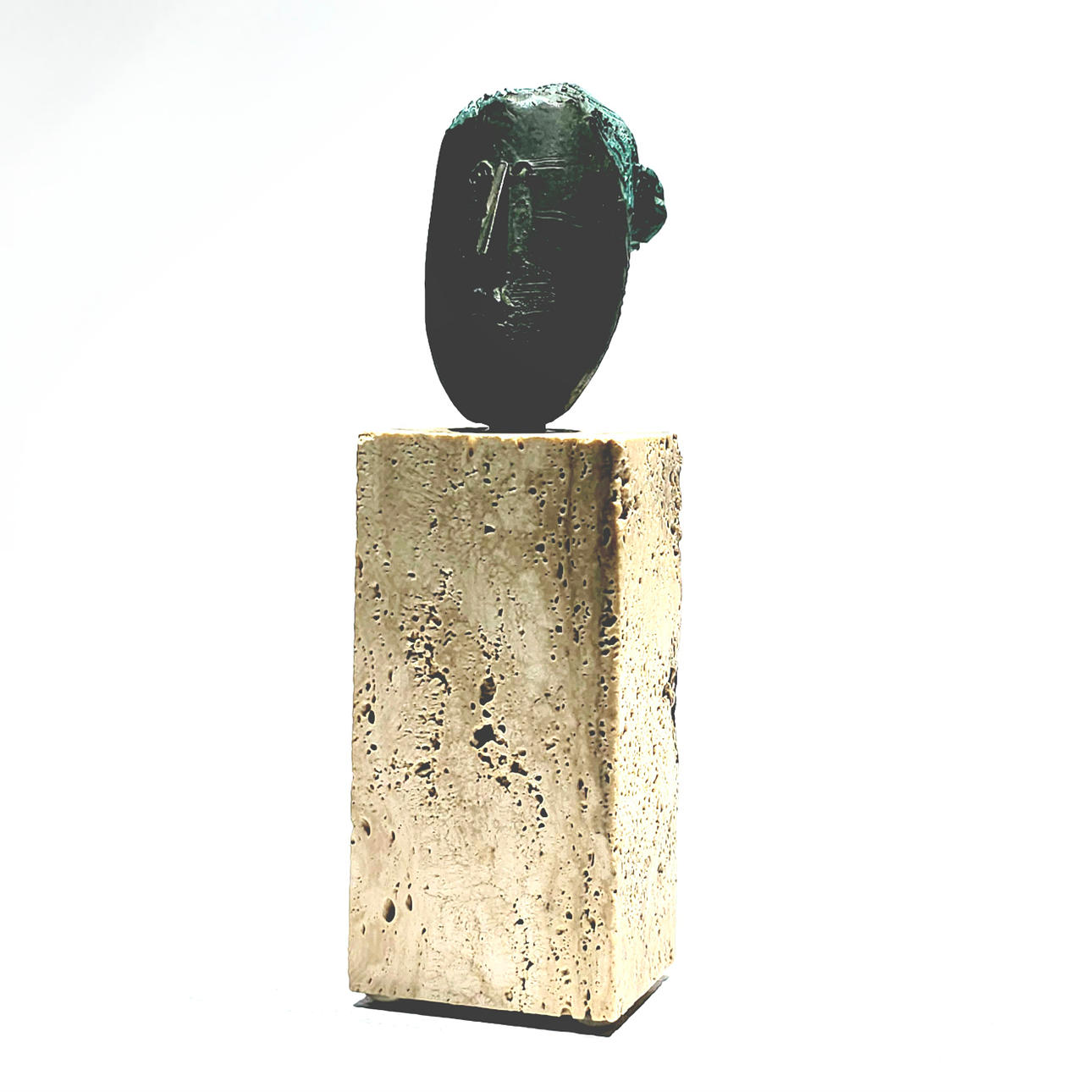 “Face” sculpture, in patinated terracotta.