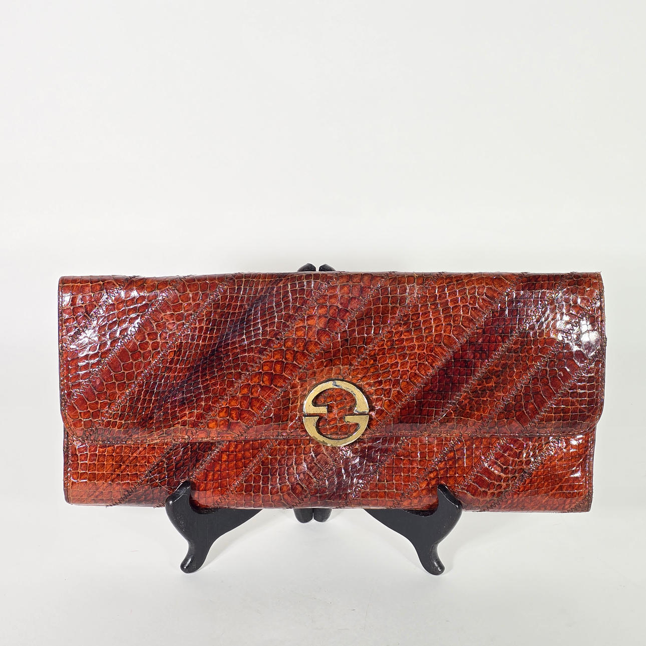 BOLSO DE MANO COCODRILO.