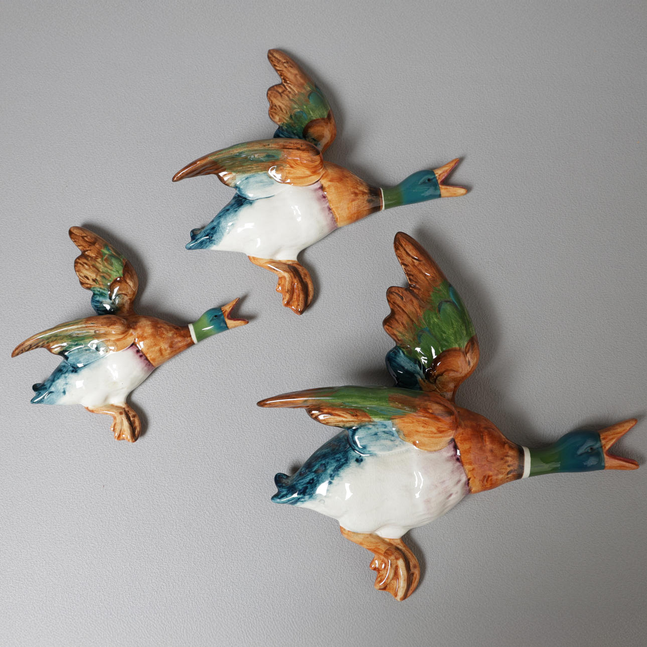 THREE BESWICK FLYING DUCKS (3).