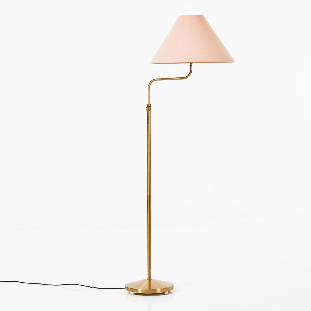 A mid 20th century brass floor lamp, marked E1748, ASEA.