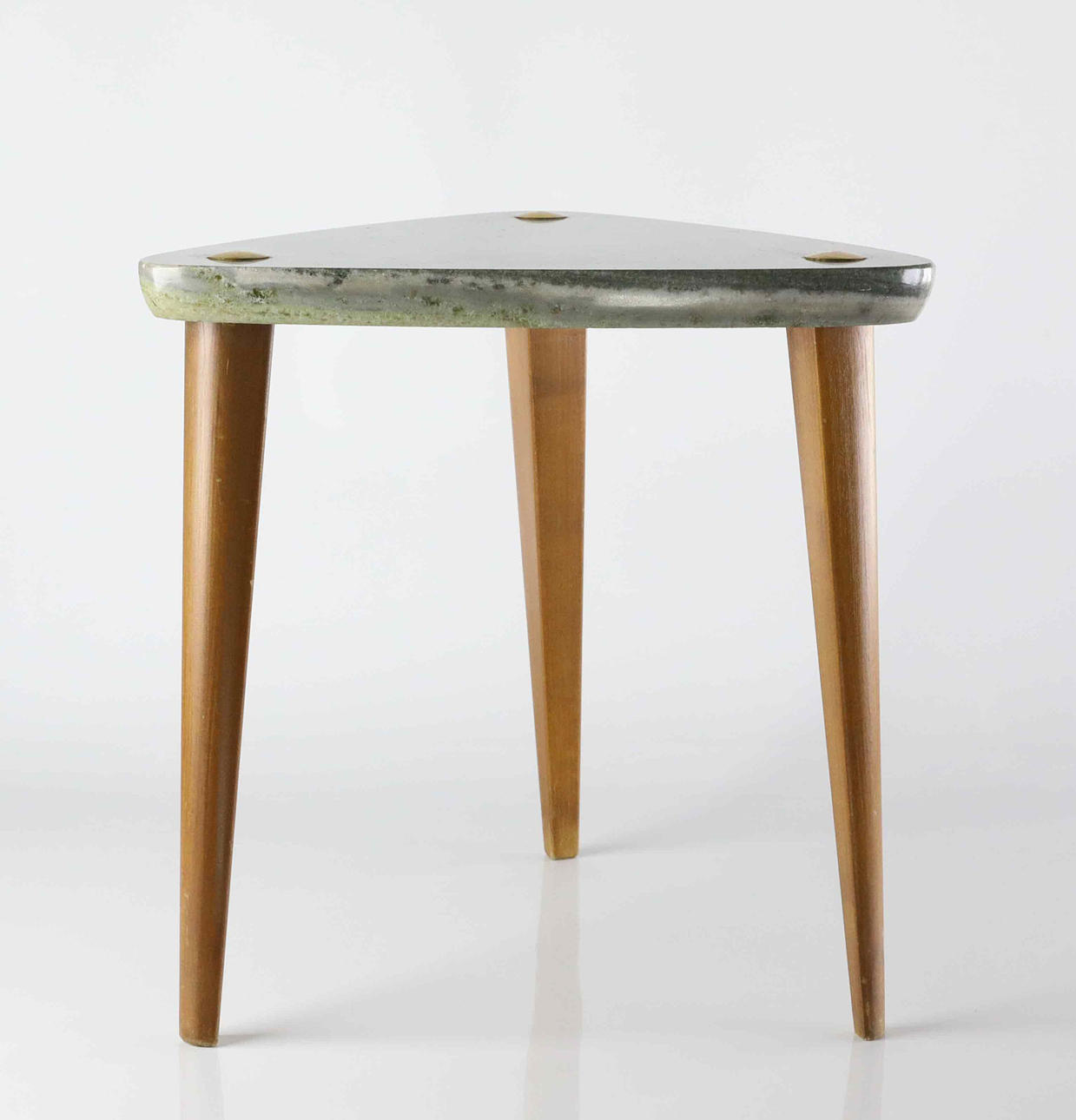 A Swedish Modern stone side table, 1940s/50s.