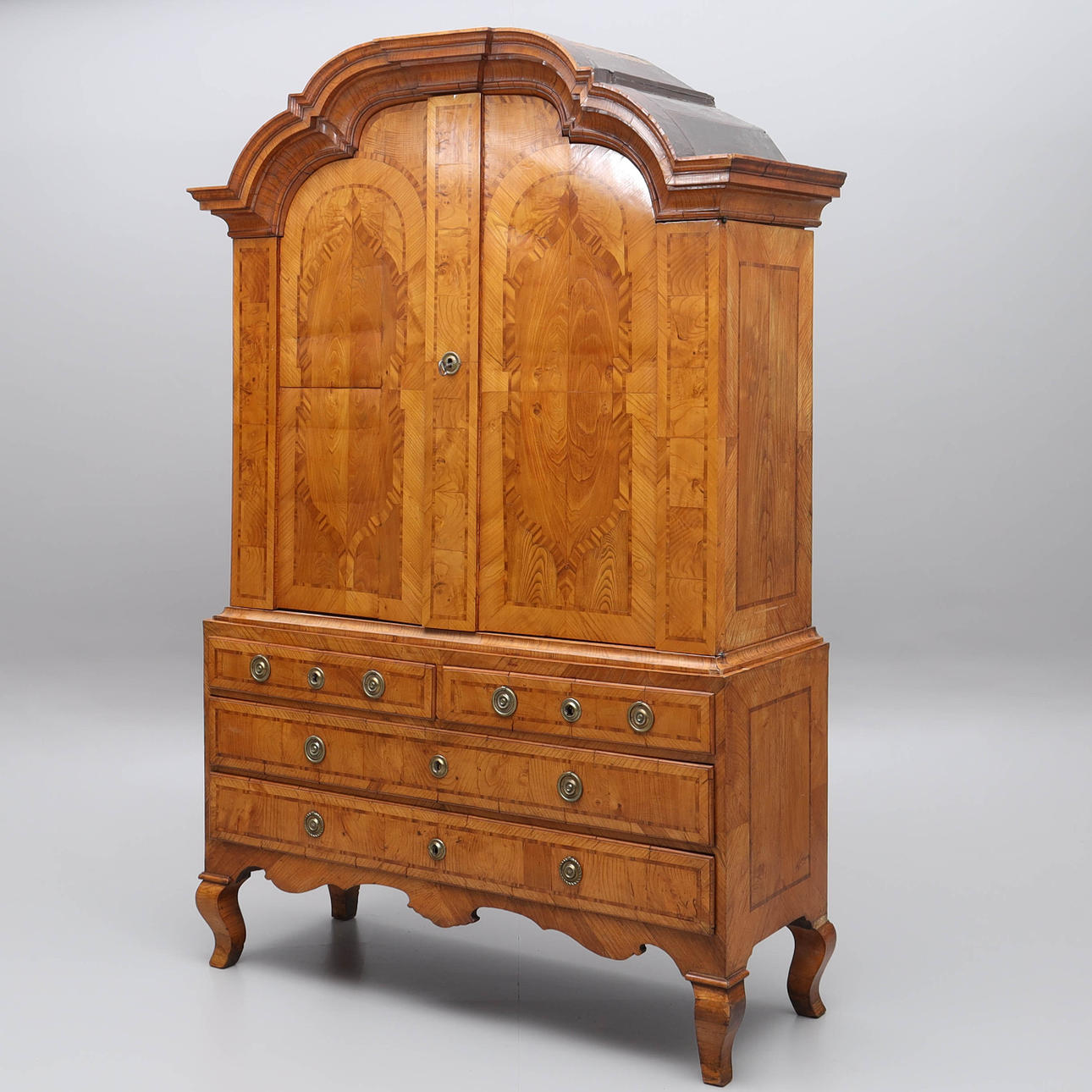 A 3-piece cabinet, intarsia work, elm, birch, pine, rococo, mid 18th century.