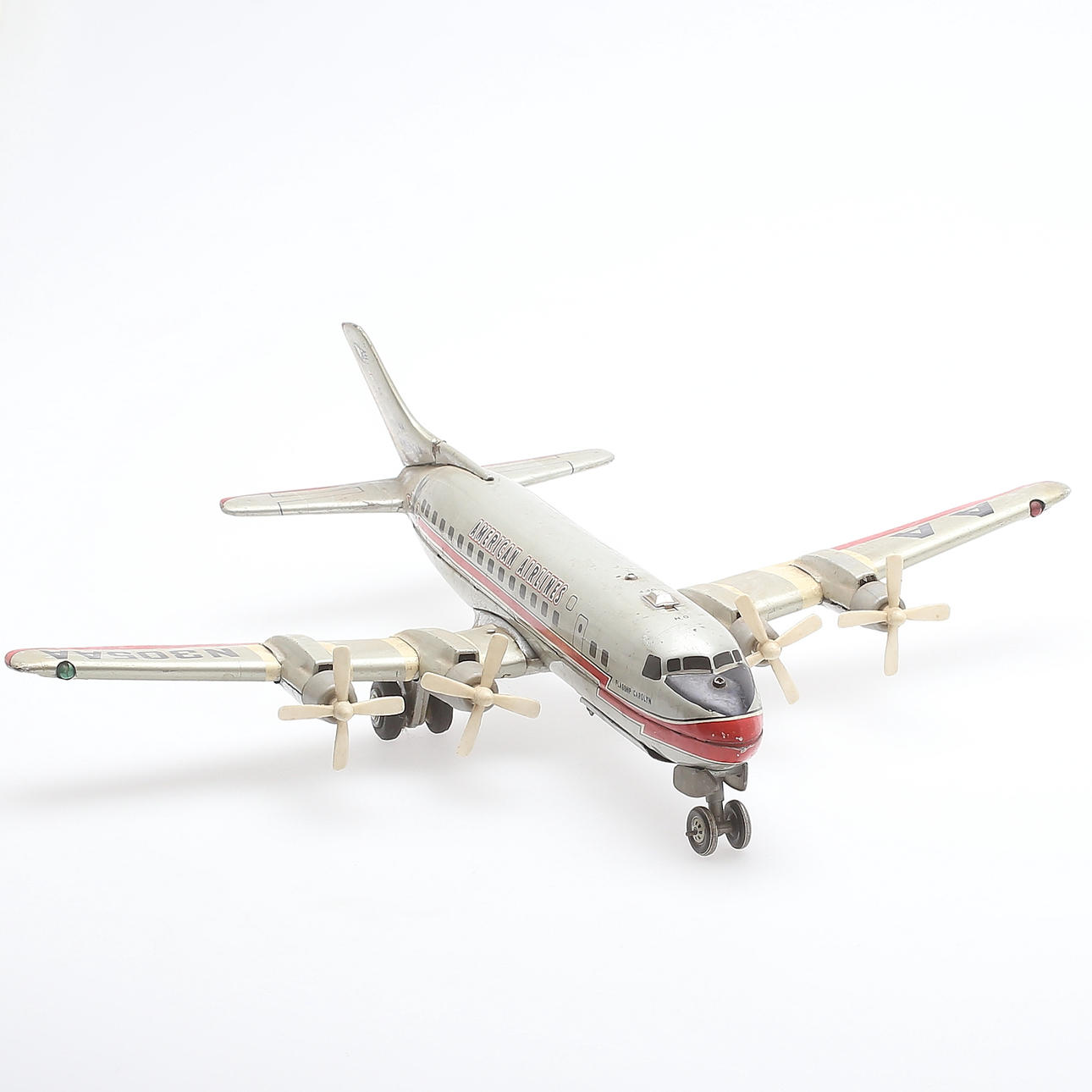 FLYGPLAN, American Airlines DC-7, N305AA. Linemar Toys, Japan, 1950-tal.