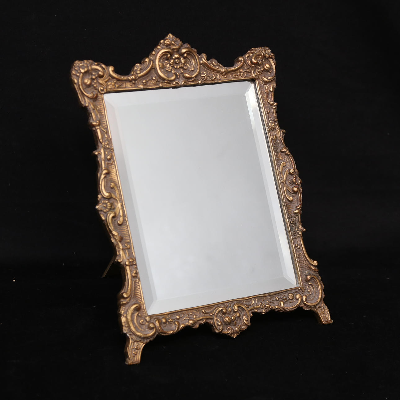 A rococo style table mirror, first half of the 20th century.