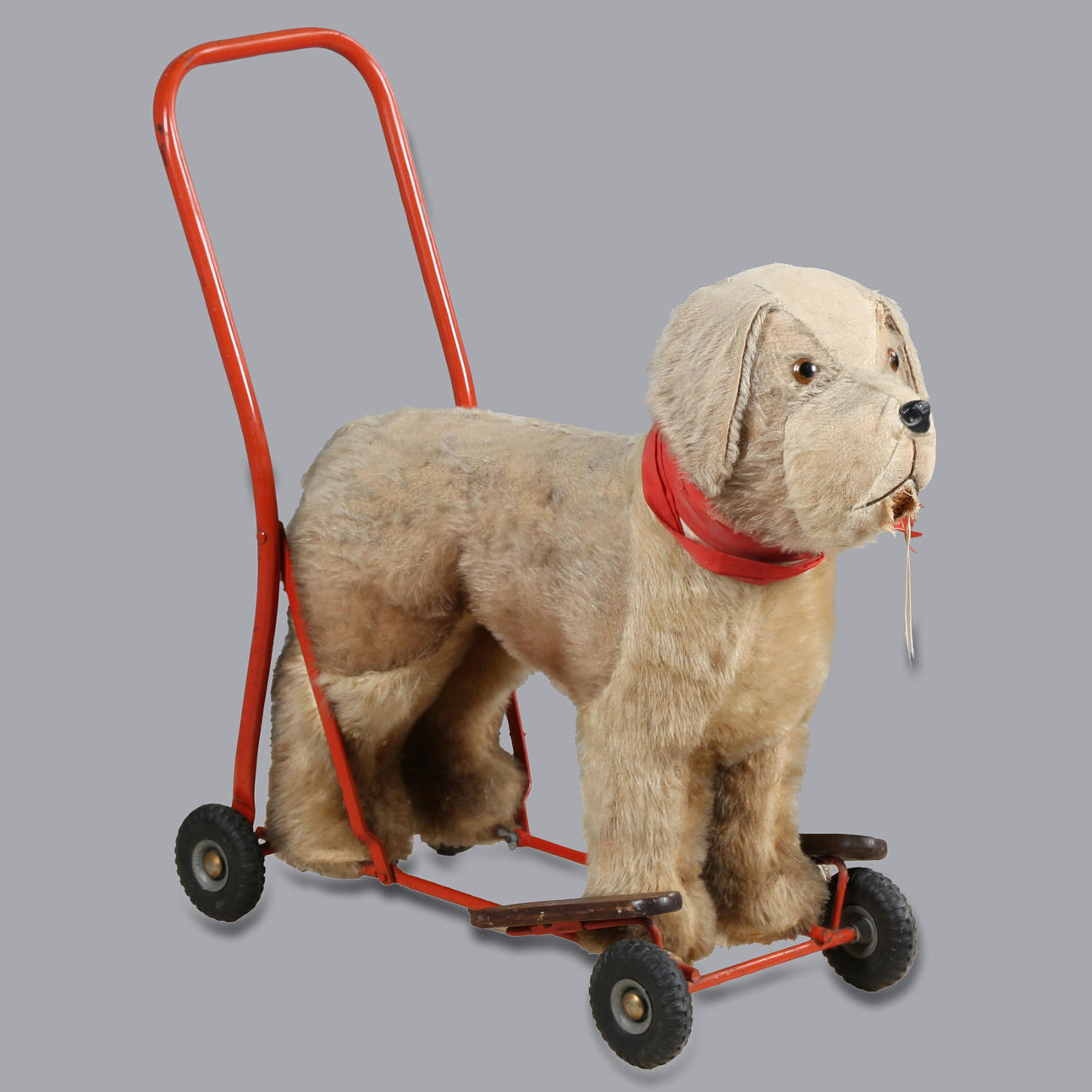 A LINES BROTHERS PUSH-A-LONG TOY DOG.