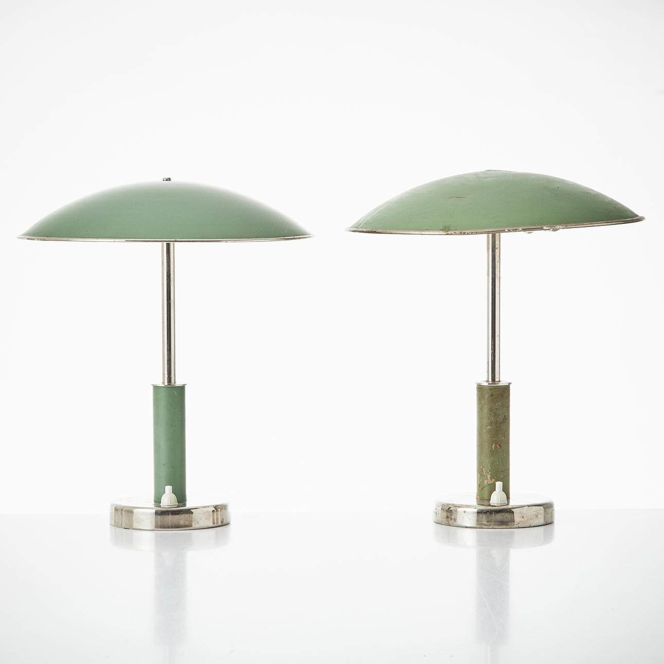 ERIK TIDSTRAND. Table lamps, a pair, Nordiska Kompaniet, 1930/40s, funkis, model 28655, nickel plated and painted in green.