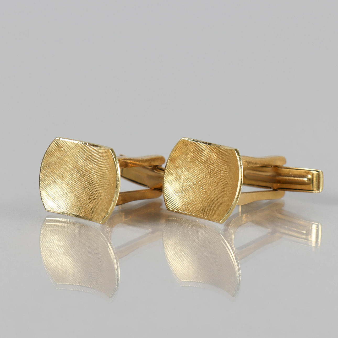 MANSCHETTKNAPPAR paret, 18k guld.