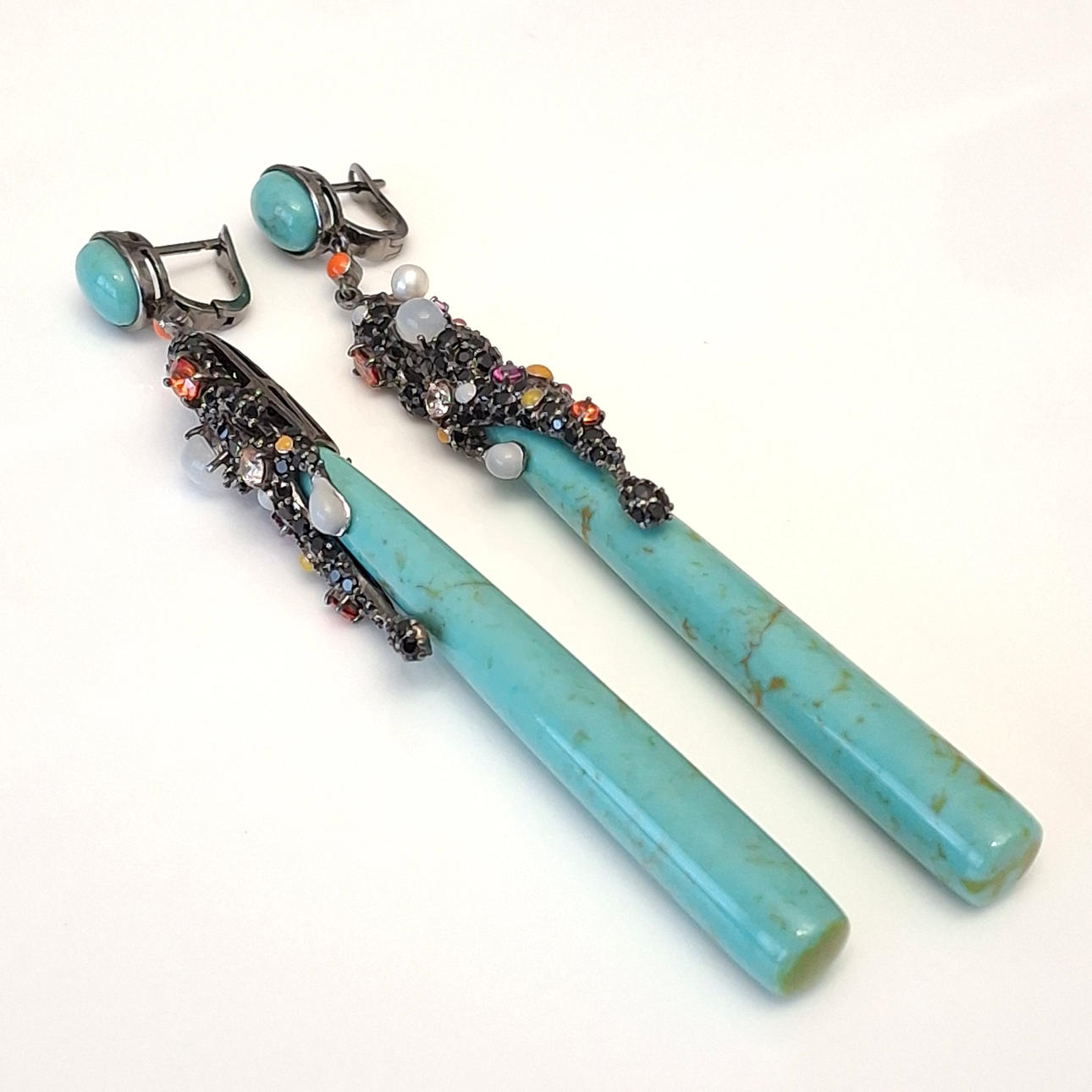 Long earrings with a tubular amazonite design with multicolored zirconia application. Black rhodium-plated silver frame. Brand new.