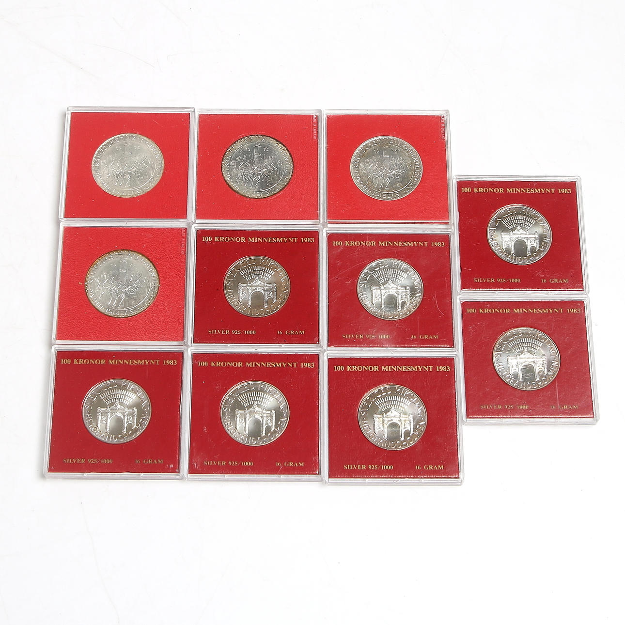 MINNESMYNT, 11 st, sterling silver, bl.a. 100 kr. "Sveriges Rikstag Helgeansholmen", 1983.