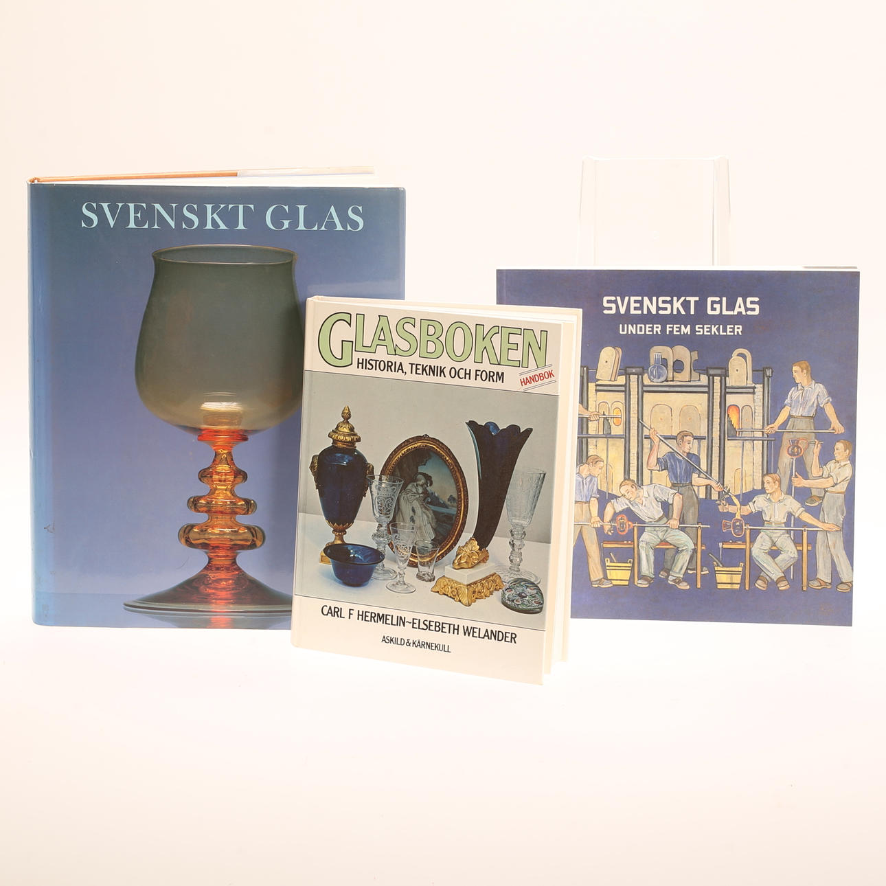 Three books, Swedish glass.