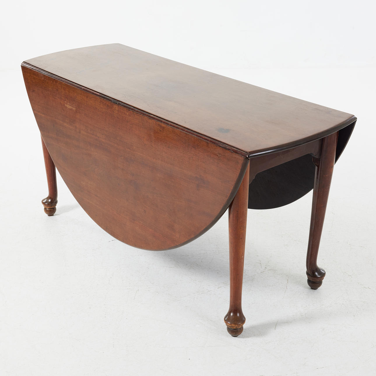 A 19th century England percussion table, partly solid mahogany veneer.