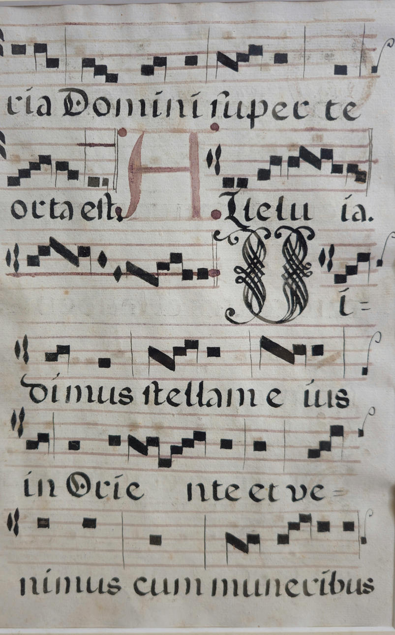 FRAMED ANTIQUE PARCHMENT IMITATION SHEET.