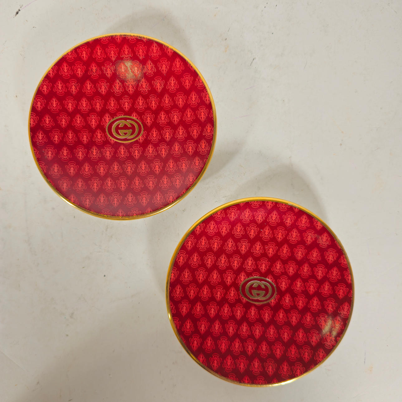 PAAR GUCCI-ASCHENBECHER.