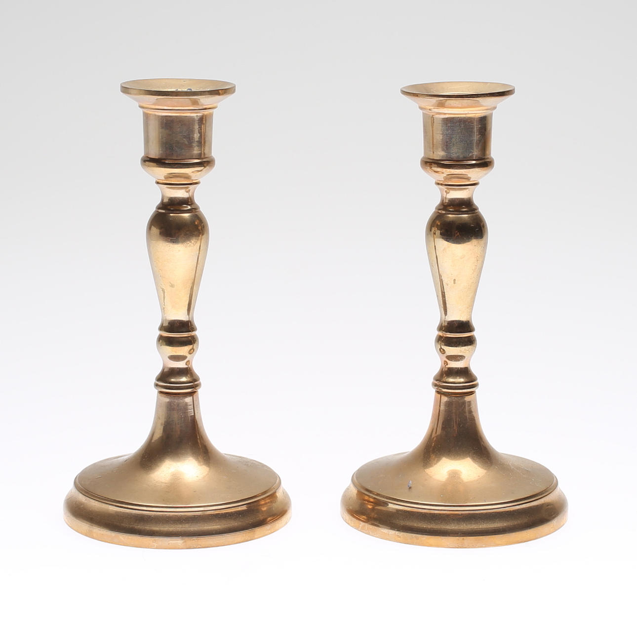 LJUSSTAKAR, ett par, malm, Bersbo, Katarina, 1983.