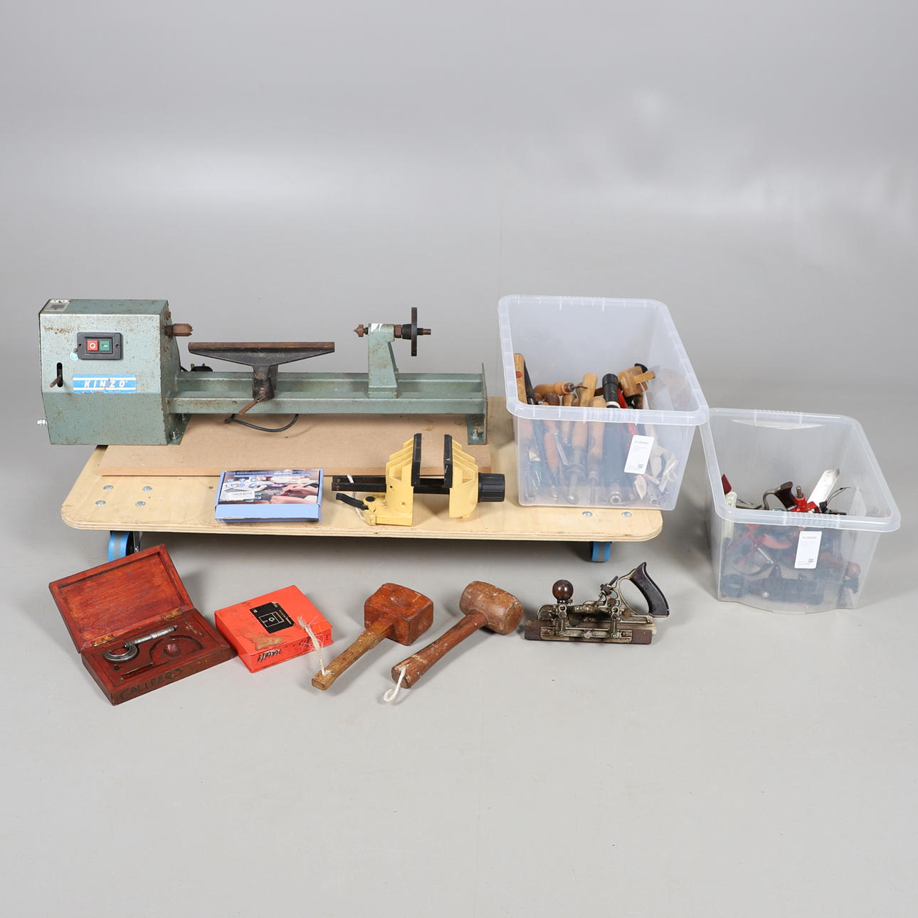 A KINZO WOOD TURNING LATHE.