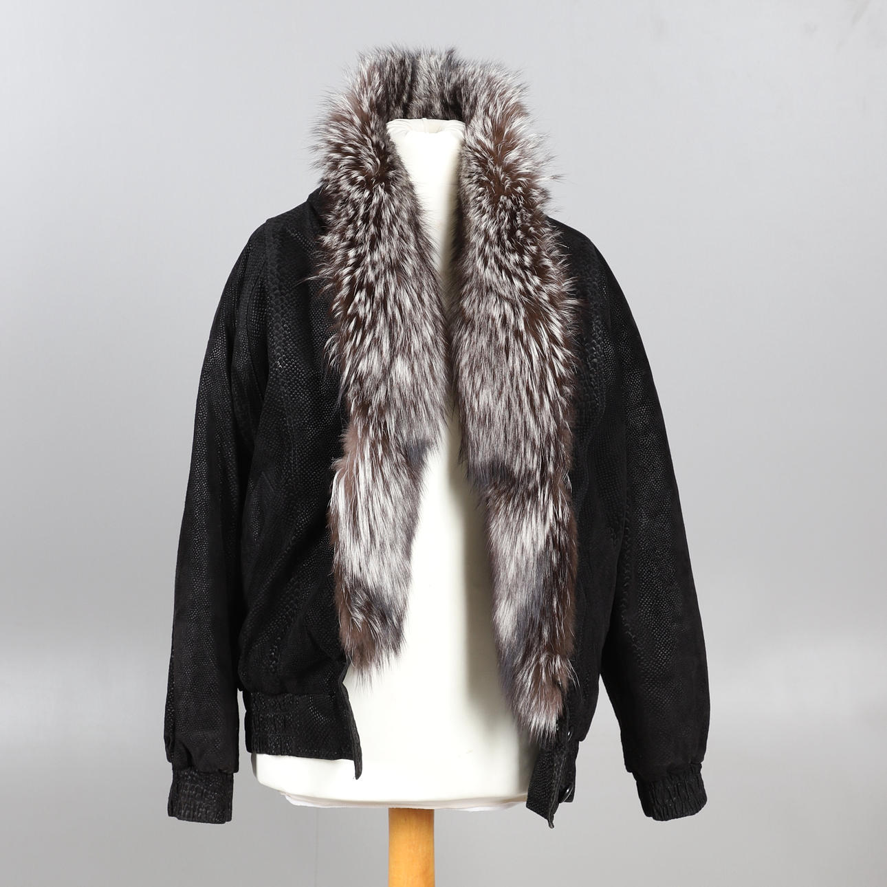 LEATHER AND FUR BLOUSON JACKET.