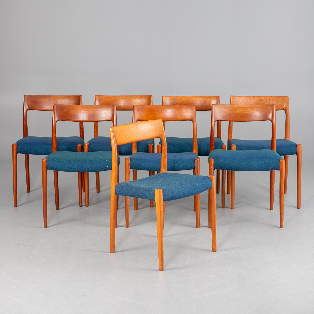NIELS O. MØLLER. 8 “Model 77" chairs.