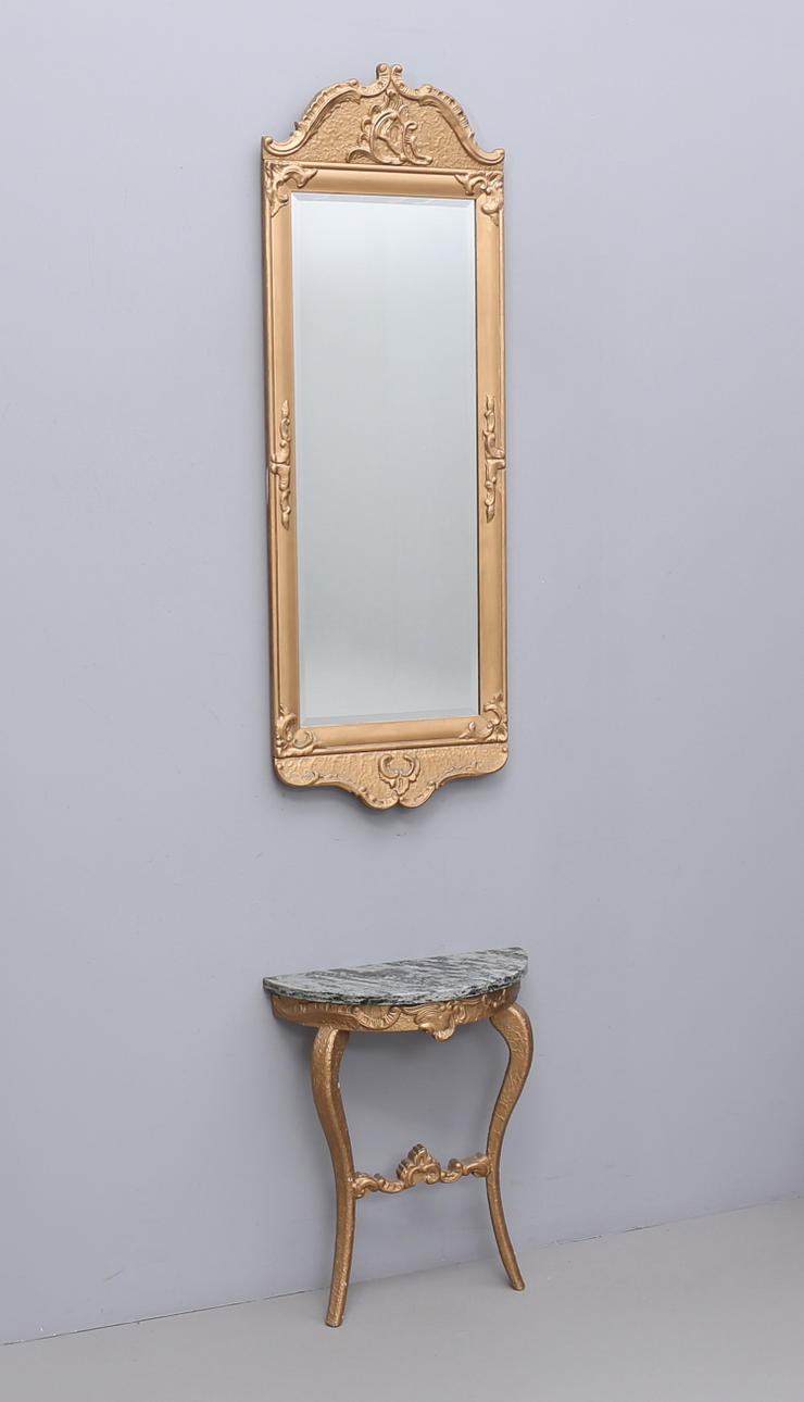 A 20th century mirror with console table.