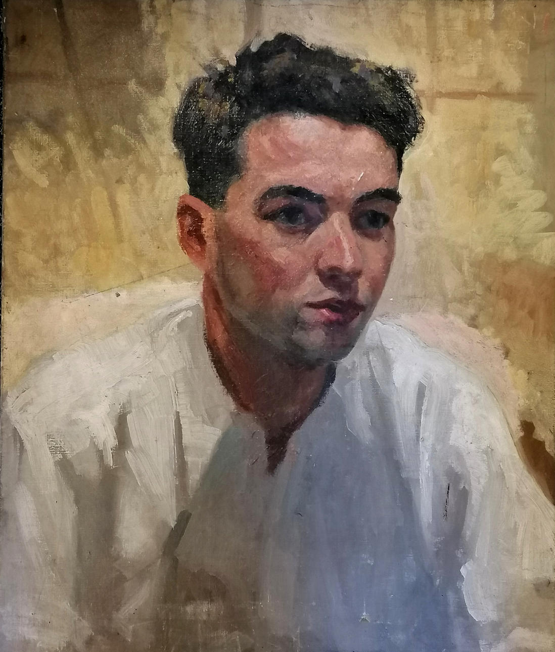 UNSIGNIERTES ÖLGEMÄLDE AUF LEINWAND MIT PORTRAIT EINES JUNGEN MANNES.