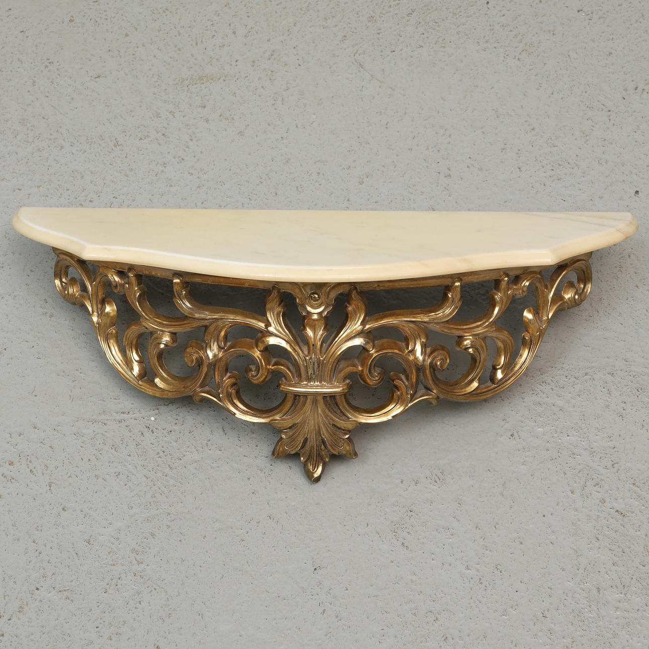 CONSOLE TABLE, wall mounted, marble and gold-coloured plastic, 1900/2000s.