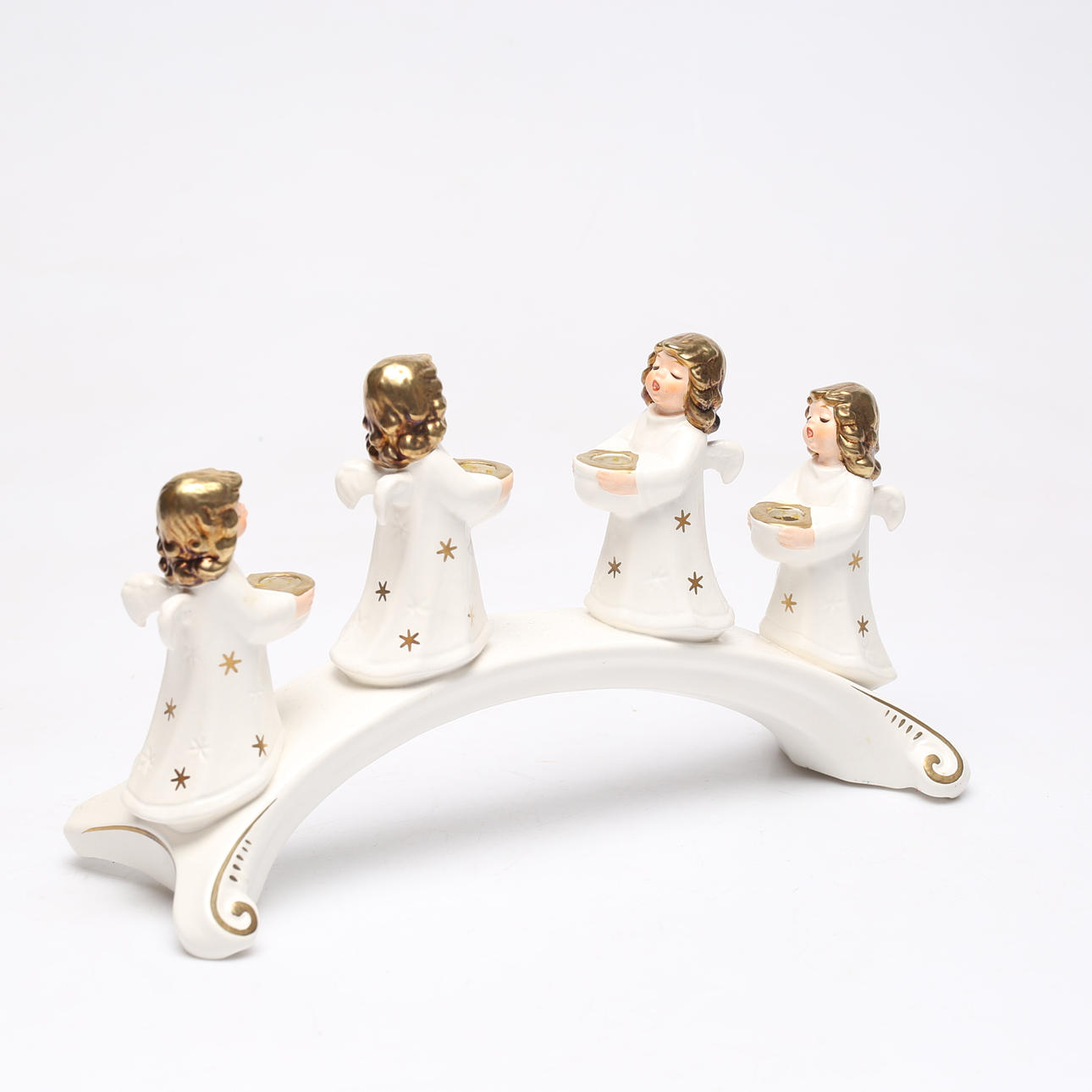 A ceramic candlestick, angels, Goebel.