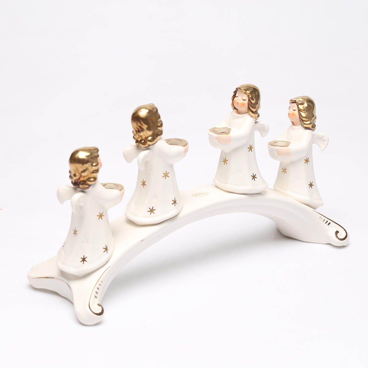 A ceramic candlestick, angels, Goebel.