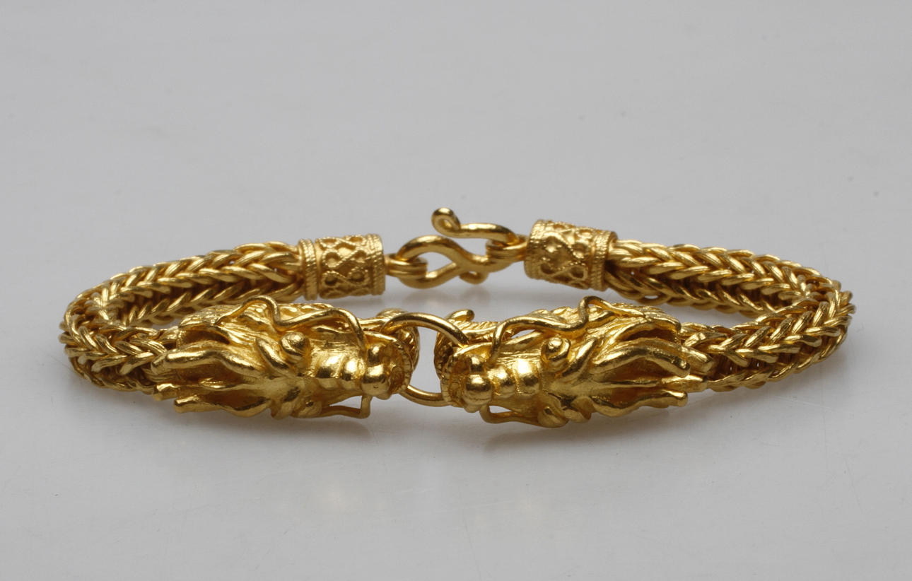 ARMBAND, 23k guld, vikt ca 30,4 gr.