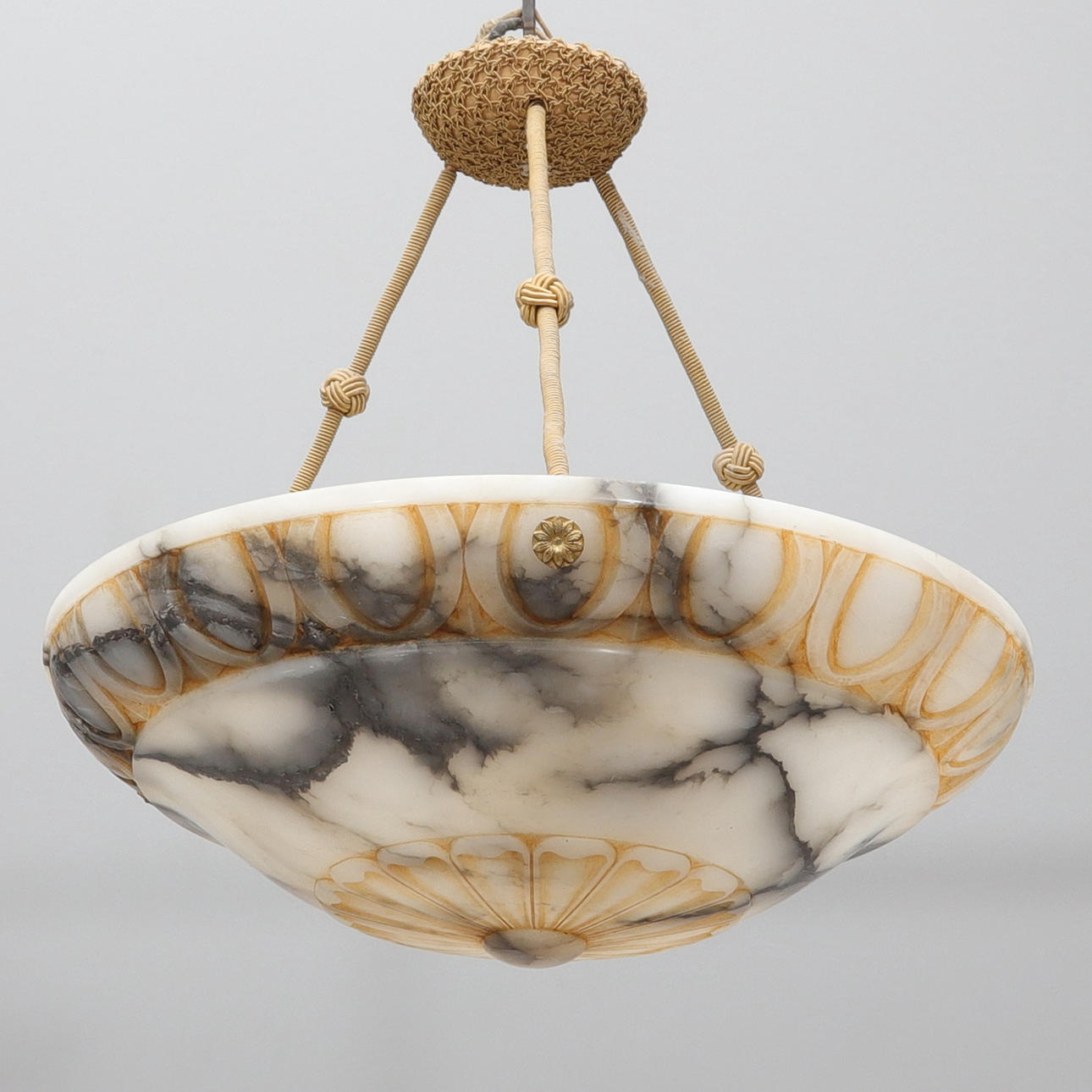 A 1920s/30s alabaster ceiling lamp.
