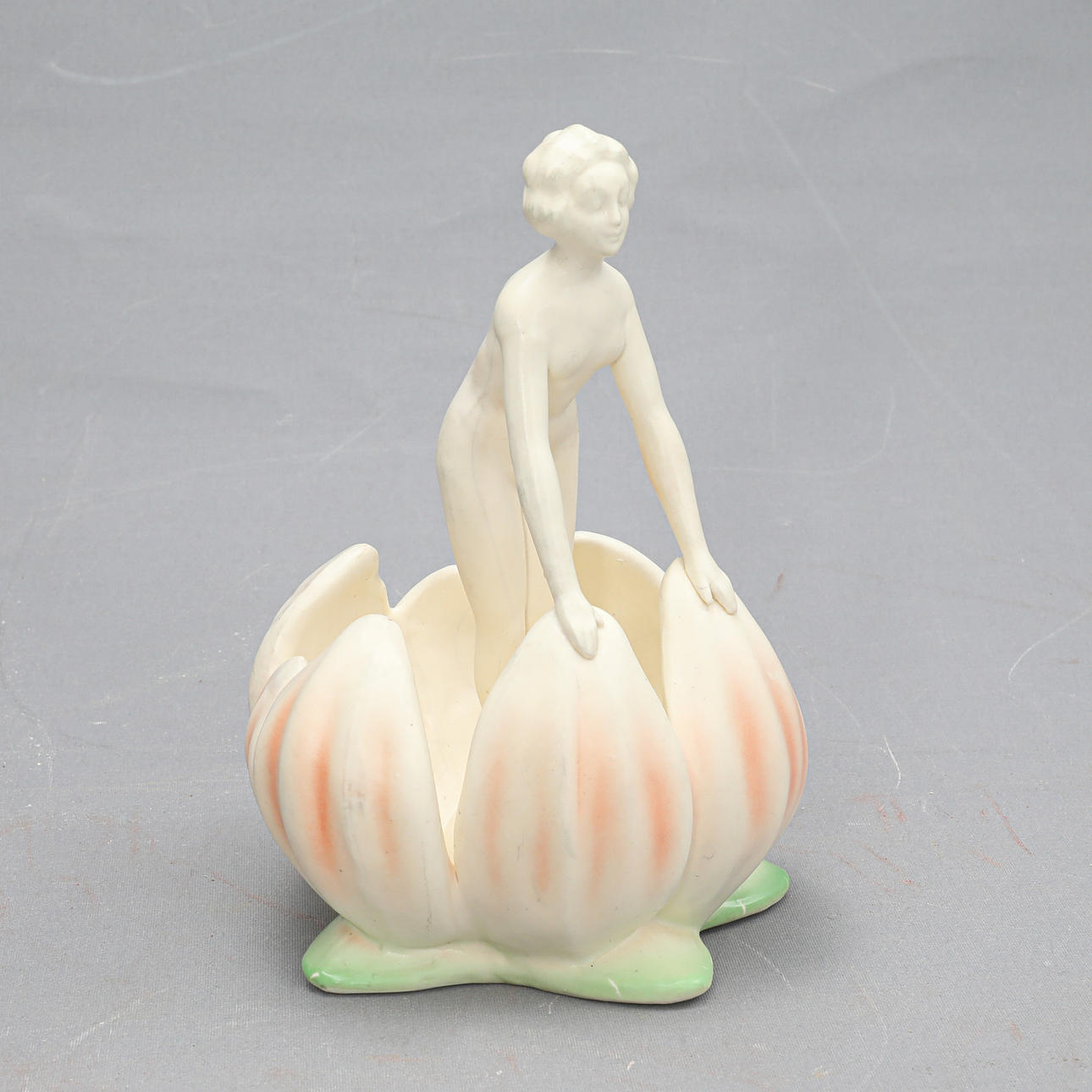 FIGURIN/BLOMSTERHÅLLARE.