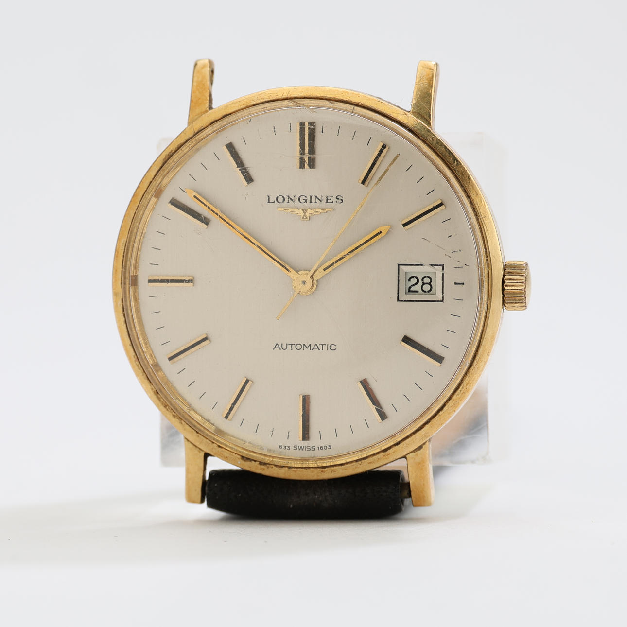LONGINES 18K gold, automatic, date, 1970s.