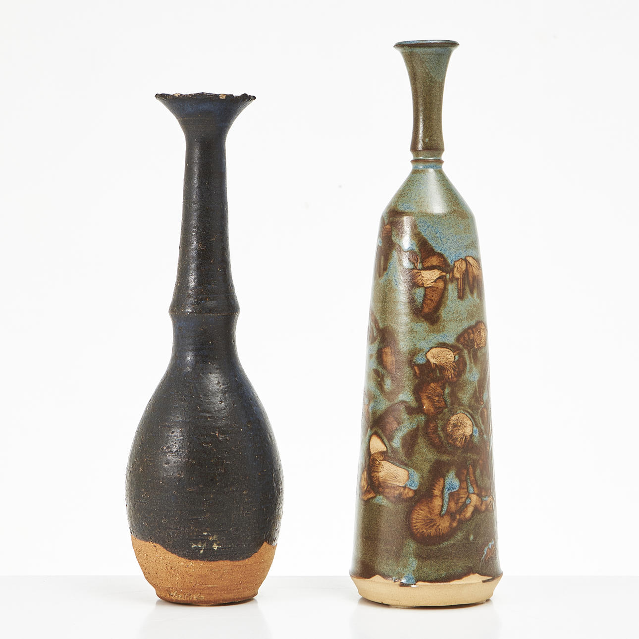 ISAK ISAKSSON. A set of 2 vases, glazed stoneware, signed Isac 80 and Isac.