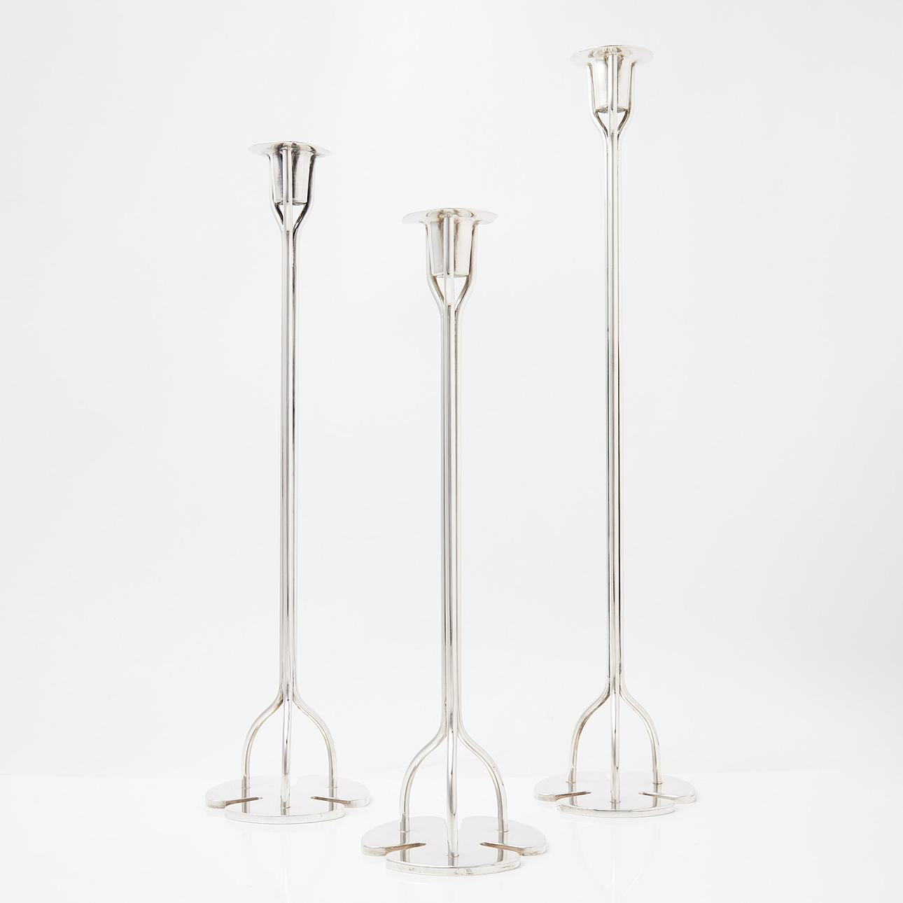 JOSEF FRANK. A set of 3 “Clover” candlesticks, Svenskt Tenn, model designed in 1952.