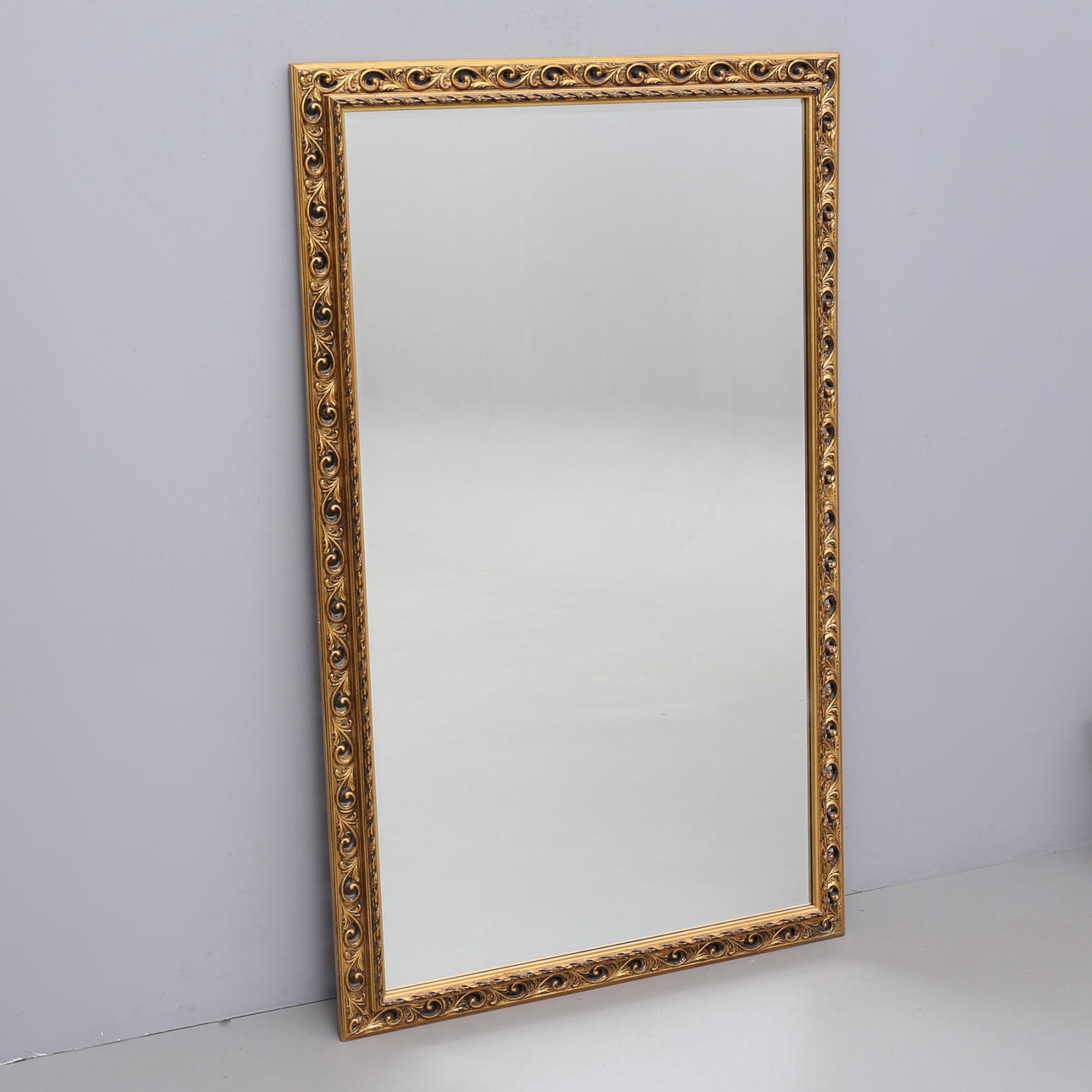 A mirror, with faceted glass, later part of the 20th century.
