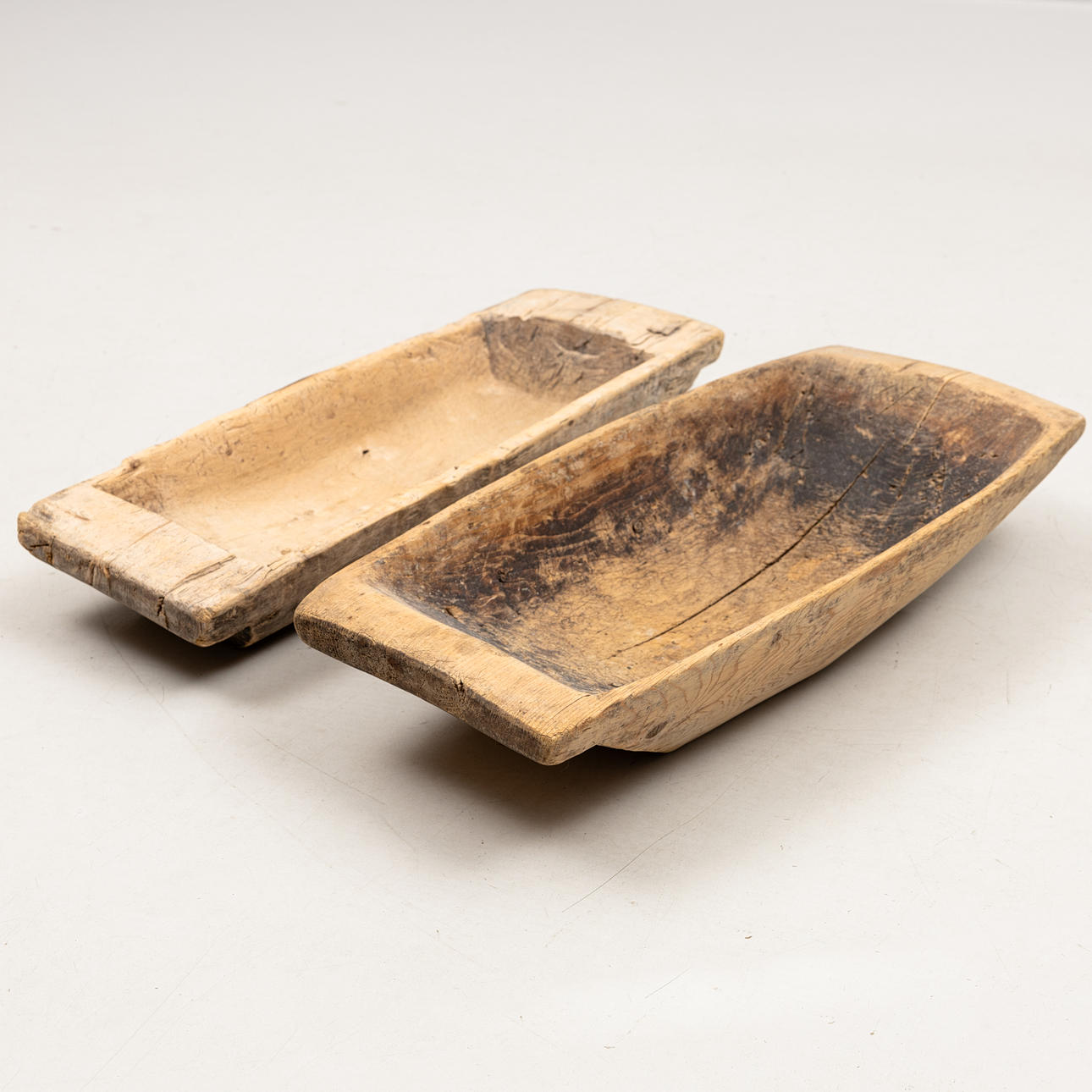 Two wooden troughs, 17th-19th century.