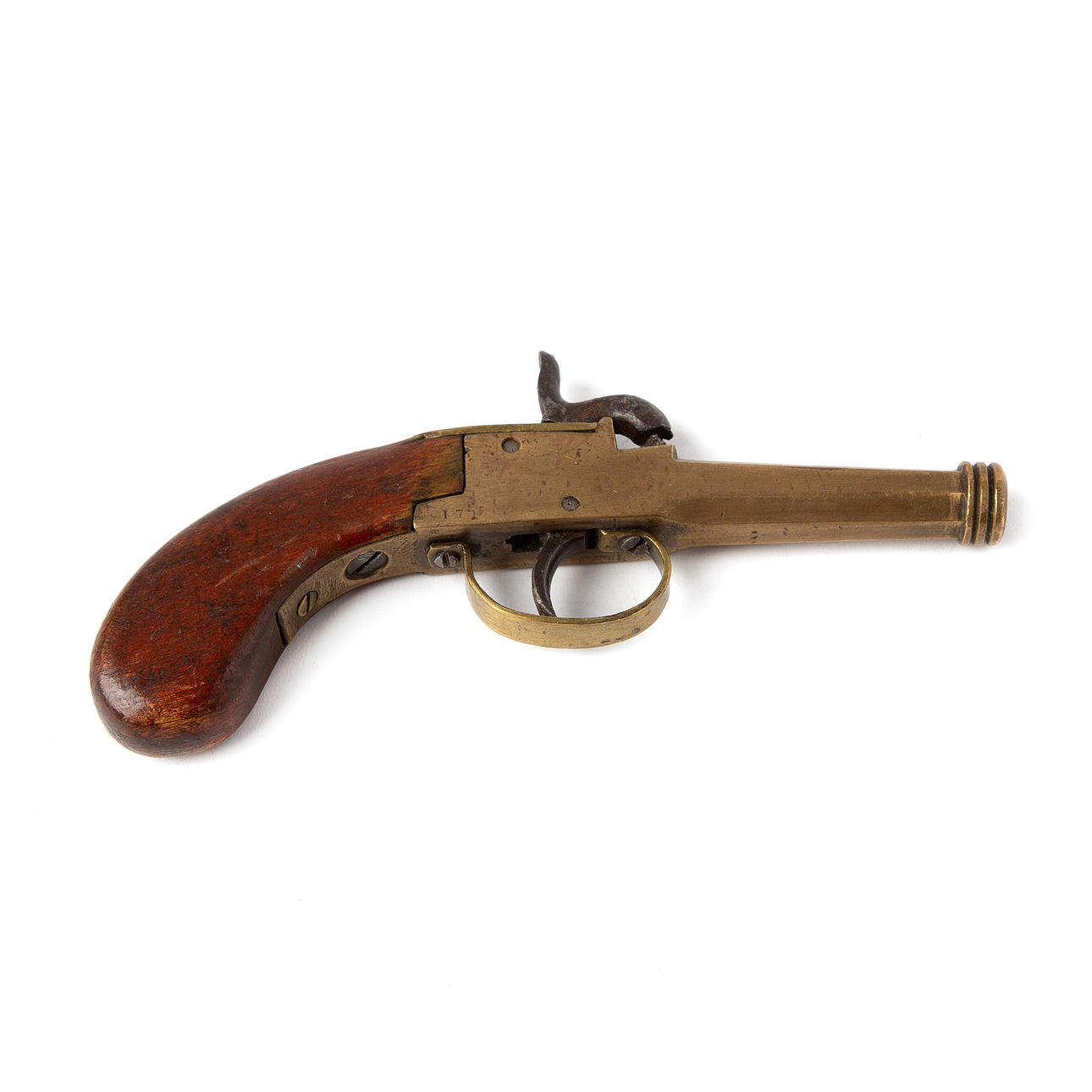 IMPACT LOCK GUN. Brass, 19th century.