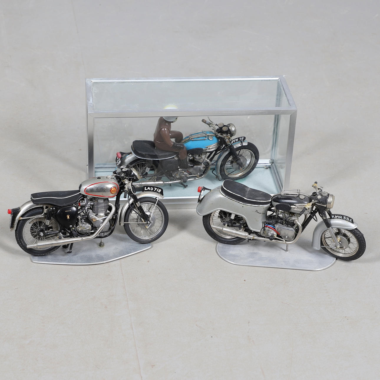 THREE SCRATCH BUILT MODEL MOTORCYCLES.