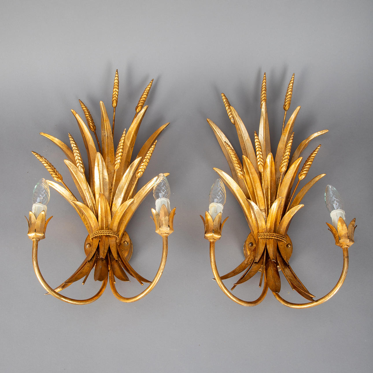 HANS KÖGL. Attributed to. Pair of Hollywood Regency style wall lamps, 1970s (2).