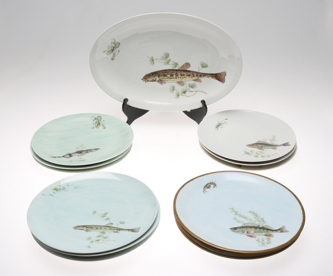 TALLRIKAR, 13 st, porslin, fiskmotiv, 1900-tal.