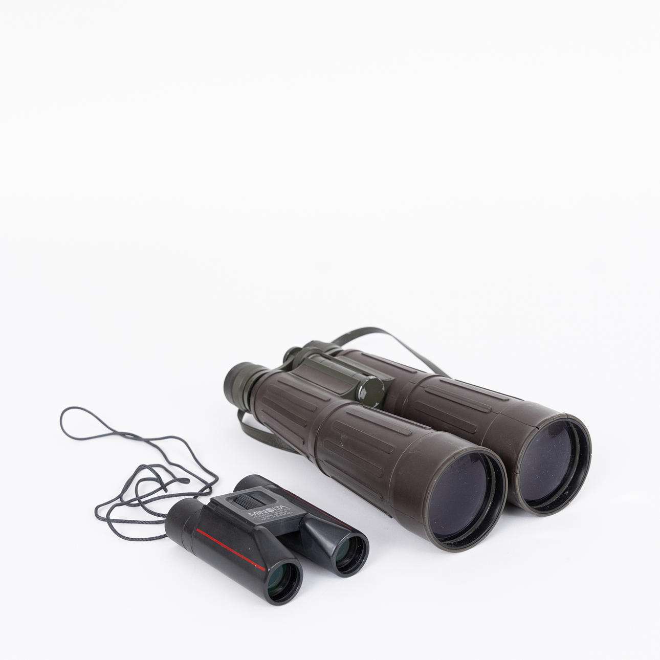Binoculars 2 pieces, Minolta and Zenith.
