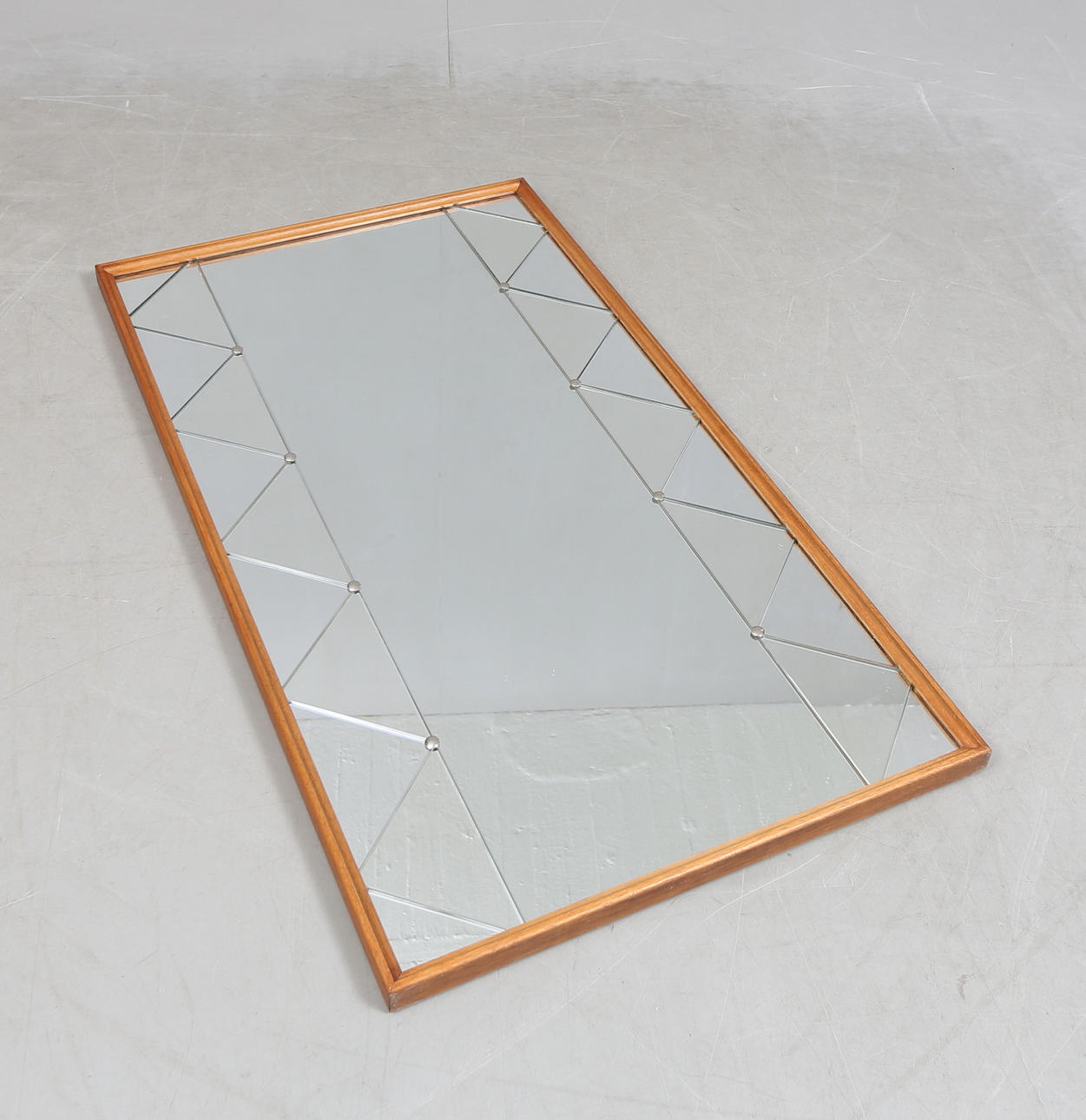 A 1960 century teak mirror.