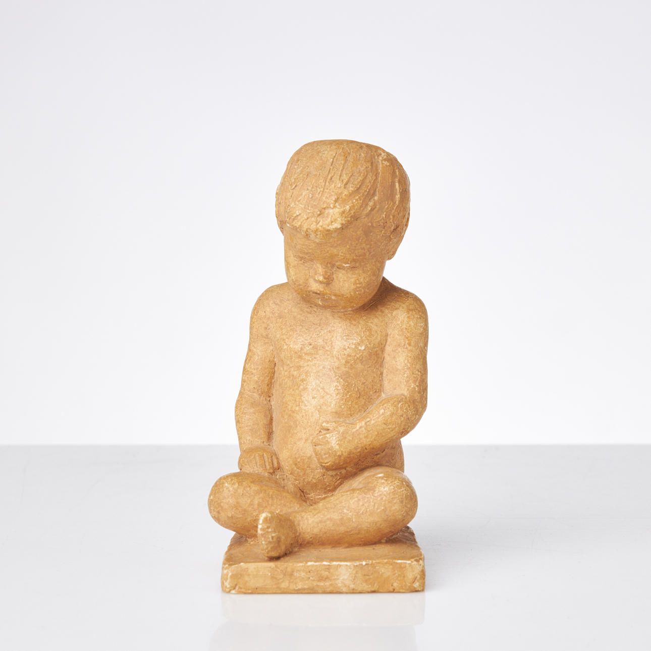 DAVID WRETLING. Sculpture, sitting boy, painted plaster.