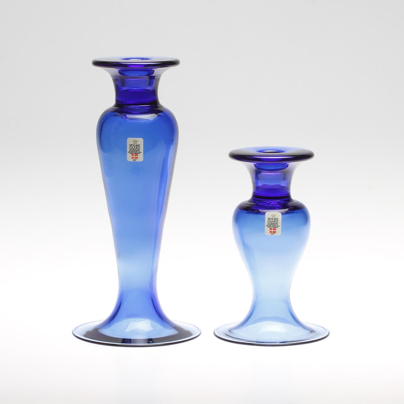 LJUSSTAKAR/VASER, 2 st, glas, Holmegaard, Danmark.