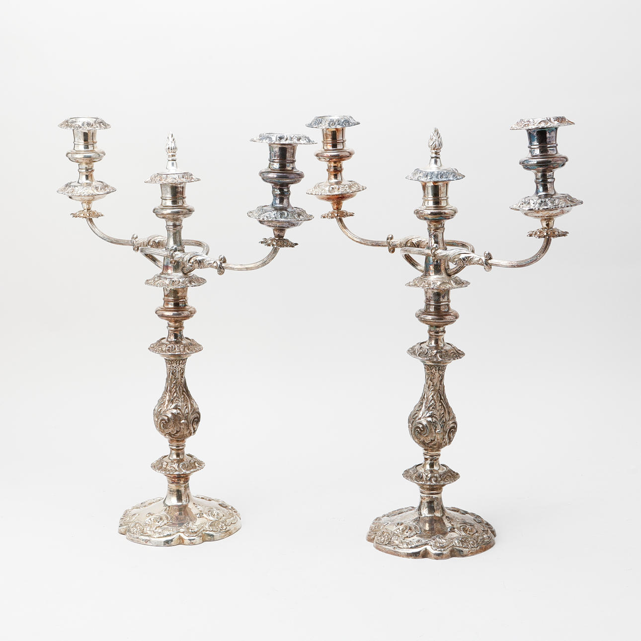 A pair of silver plate candelabra from the first half of the 20th century.