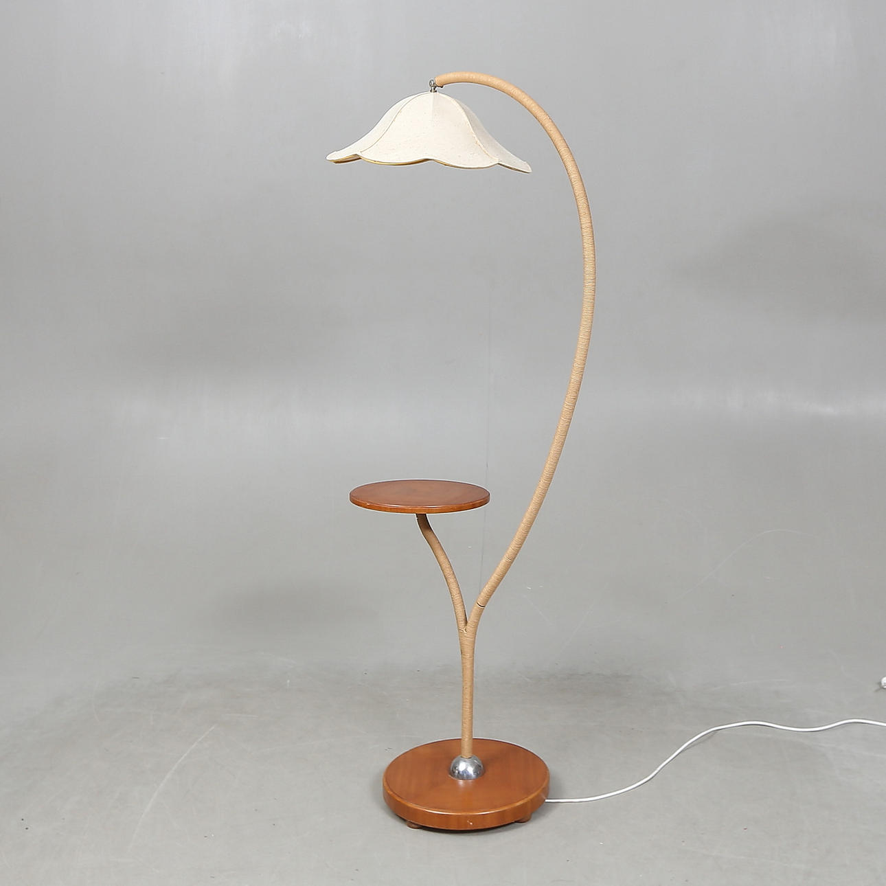 An art deco floor lamp with table, 1930s/40s.