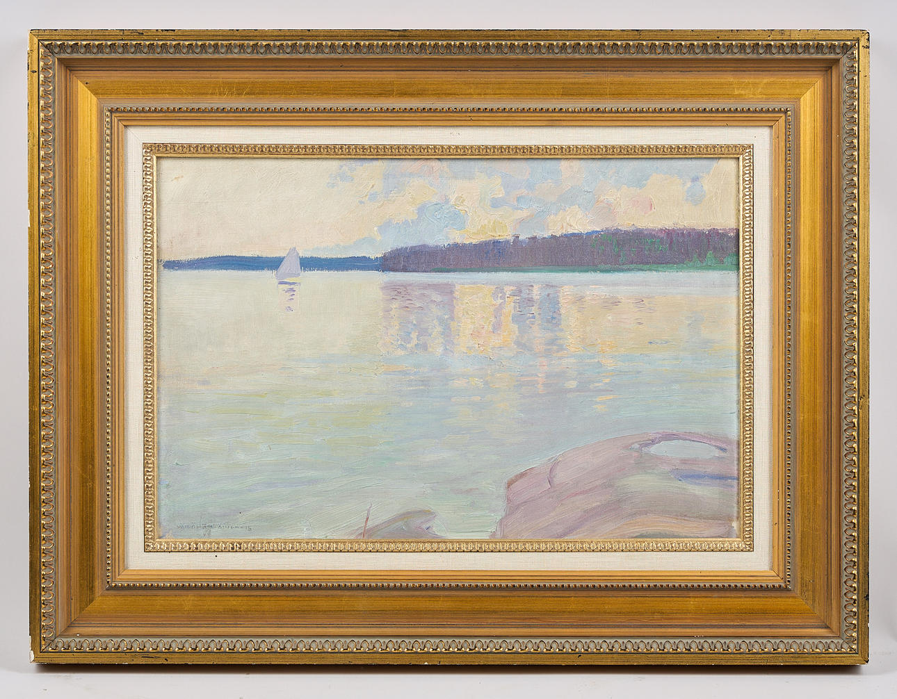 VÄINÖ HÄMÄLÄINEN (1876-1940). Sailboat in evening light, signed and dated -16, oil on panel.